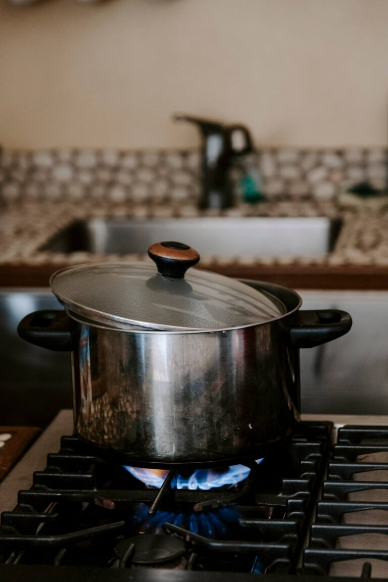 Pot of cacao cooks at training for becoming a certified yoga instructor